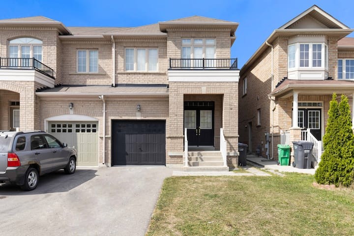 Stylish 4-Bedroom Twin Home • Private Yard Retreat